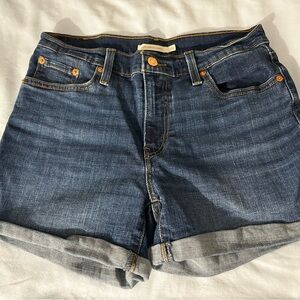 Levi's Blue Jean Shorts with Cuffed Hems and Distressed Style